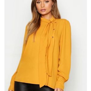Yellow blouse with necktie detail
